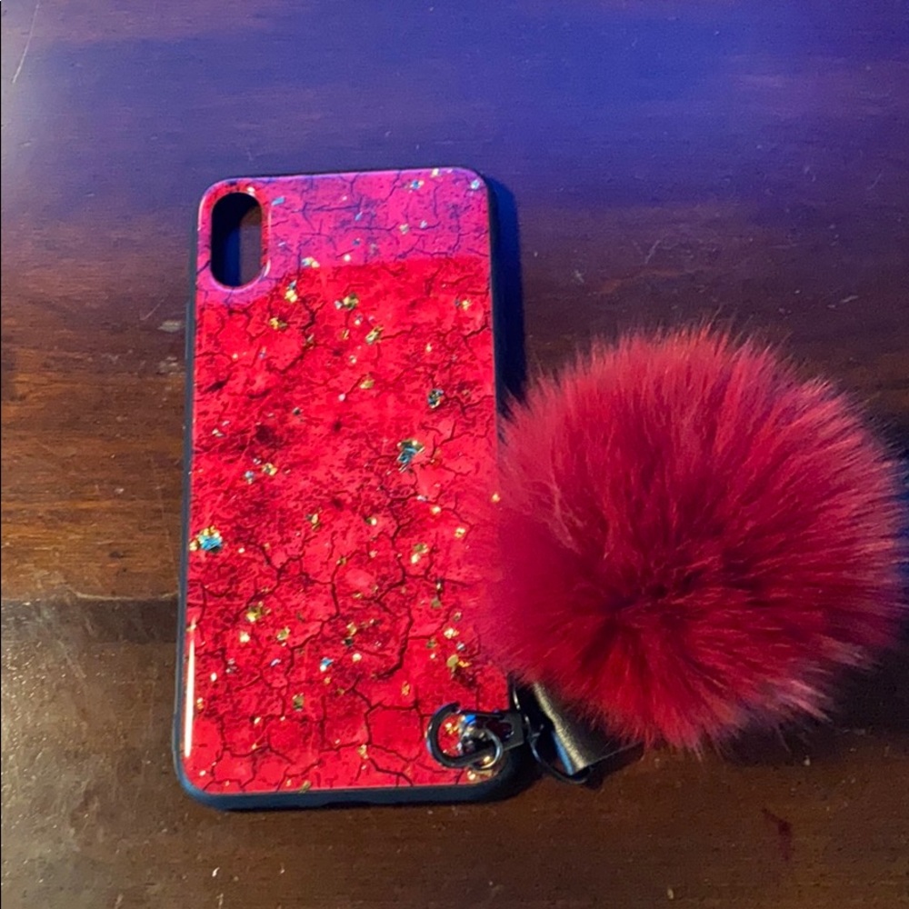 Apple iPhone case with puff ball and wristlet